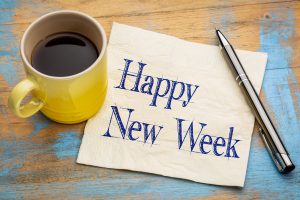 Happy New Week  - cheerful handwriting on a napkin with a cup of coffee